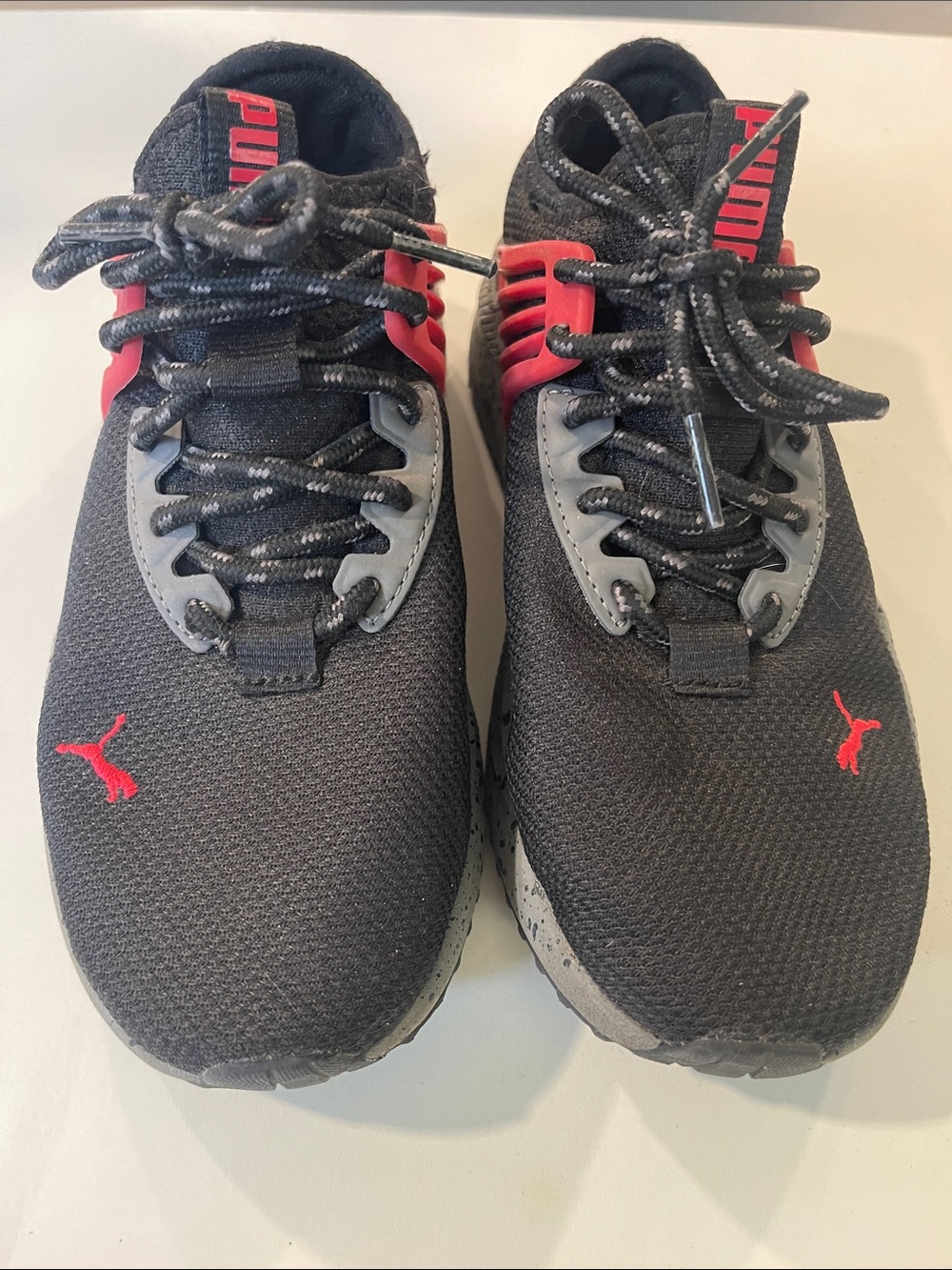Puma kids Black Sneakers with Red Accents size 4c. Pacer feature shoes